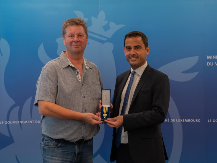 Médaille remise à Romain